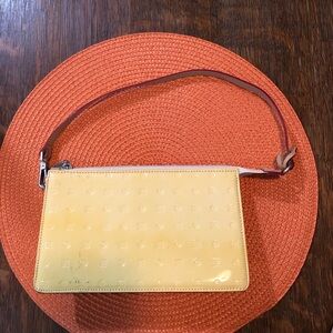 Arcadia patent leather pochette.